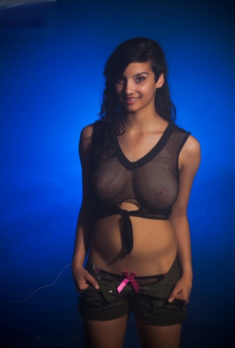 Indian female models non nude in a see thru top and shorts