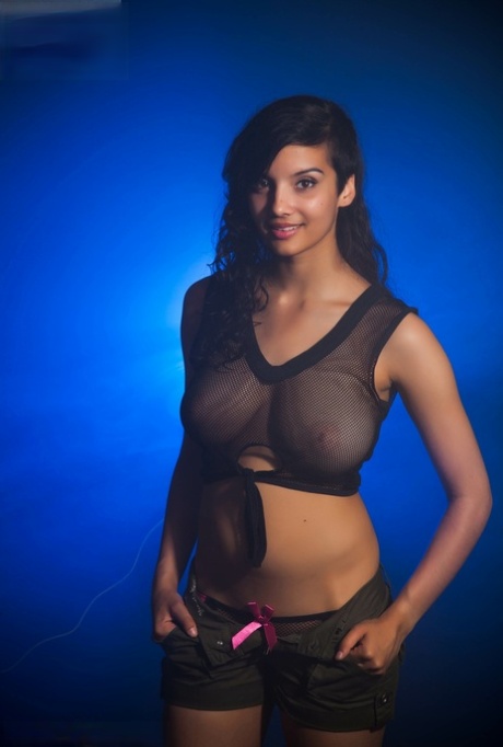 Indian female models non nude in a see thru top and shorts