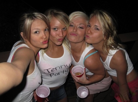 Lesbian teen babes stripping outdoor at the party to show pussy