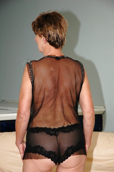 Big titted filthy granny shows her shaved cunt and her butthole