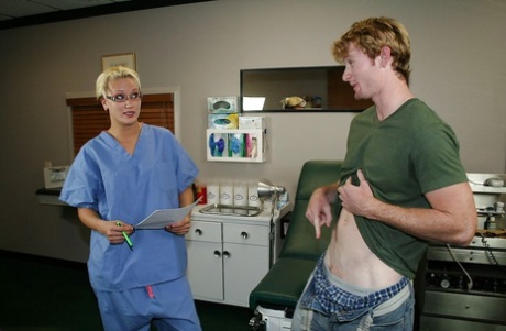 Slutty blonde babe in nurse uniform and glasses jerking off a big cock