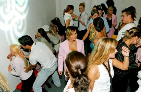 Lustful gals showing off their cock sucking skills at a gloryhole party