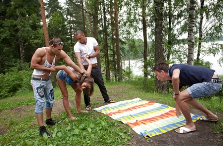Young slut gets facialized after a hardcore groupsex with horny guys outdoor