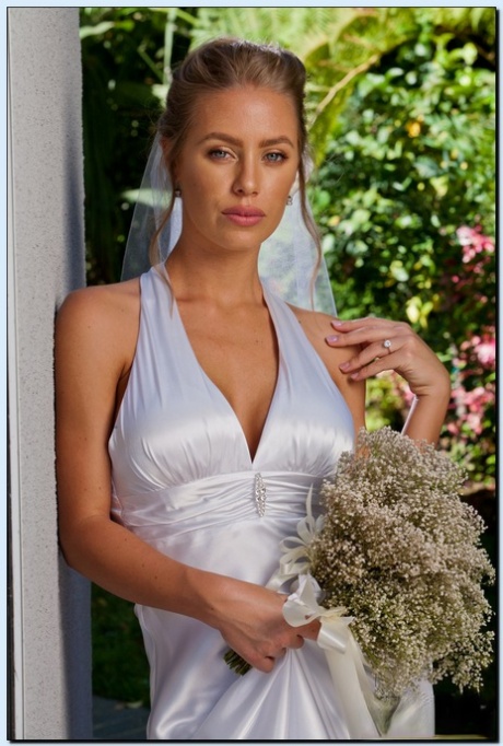 Stupendous bride in stockings gets rid of her dress and lingerie