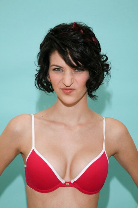 Teen with nice tits Molly Berardi stripping and teasing with her hot cleavage