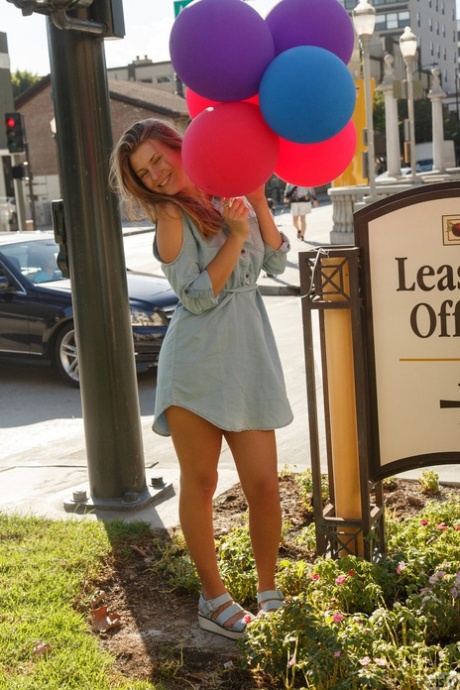 Shameless Russian teen Tatiana Penskaya flashes her panties & ass in public