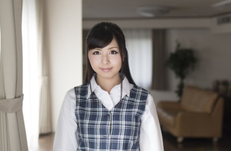 Japanese schoolgirl Ai Misaki bends over a couch and gets nailed hardcore