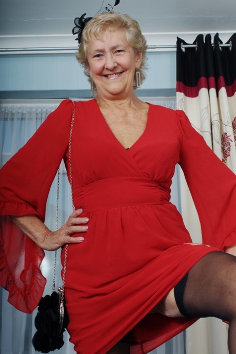 Old granny Ruth losing her red dress and exposing her saggy boobs in lingerie