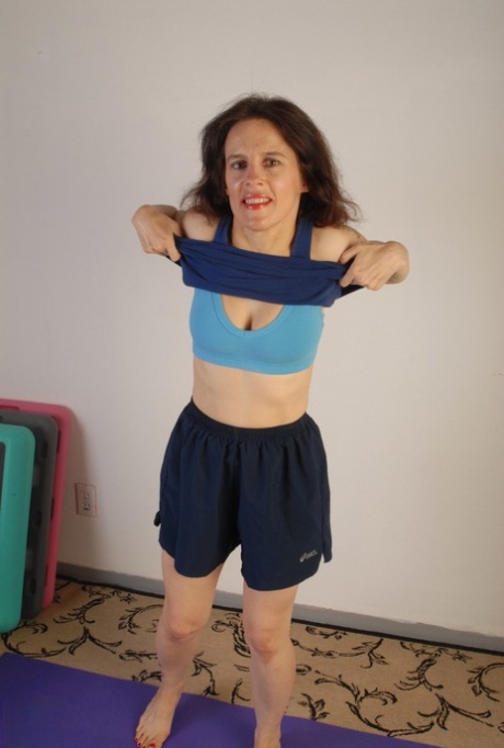 Amateur European wifey Marie Q strips nude & masturbates during a yoga session
