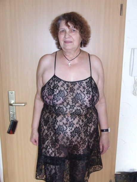 Fat granny Marlies strips and shows her saggy big tits before toying herself
