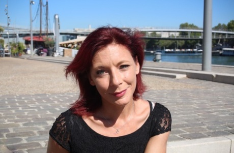 Sexy French redhead mature Morgane Dell flashes her cunt in public