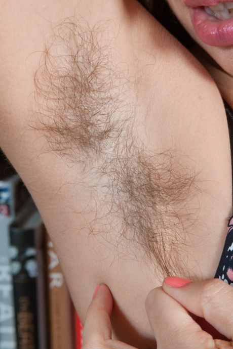 Hot amateur Simone unveiling her hairy pussy in a sexy striptease
