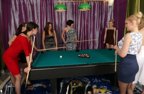Slutty lesbians having groupsex with cue sticks while playing pool