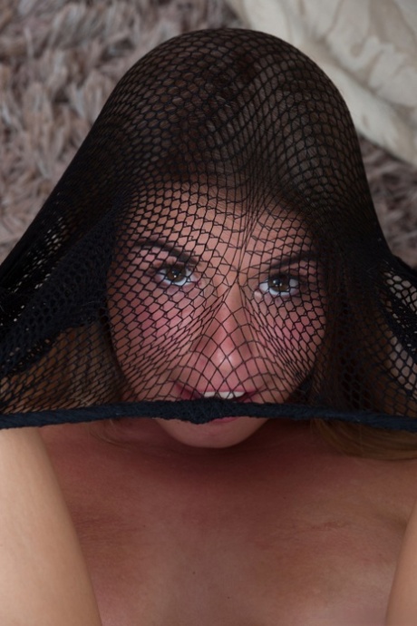 Blonde in fishnets Bunny shows her hairy twat and sticks a bottle up her ass