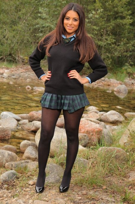 Hot babe in pantyhose Charley S flaunts her sexy big tits by the river