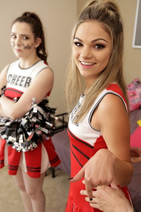 Slutty blonde cheerleader interrupts practice to fuck stepbrother for creampie
