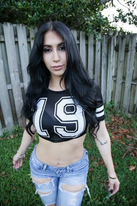 Black haired Cuban Valerie Kay exposes her huge tits and well rounded ass