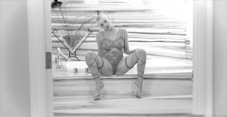 Bald blonde girl Riley Nixon gets her twat and anus filled with male meat