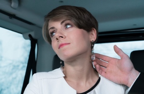 Classy short haired mature Sasha Zima seduced by limo driver for backseat boff