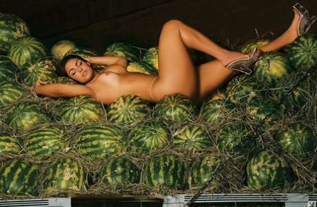 Voluptuous Brazilian Andressa Soares drips melon juice on her big juicy melons
