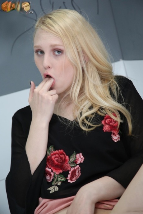Blonde babe Lily Rader takes a big black cock & swallows a load at a gloryhole
