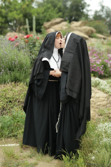 Sinful nuns with juicy boobs Penny Pax & Darcie Dolce lick each other's cunts
