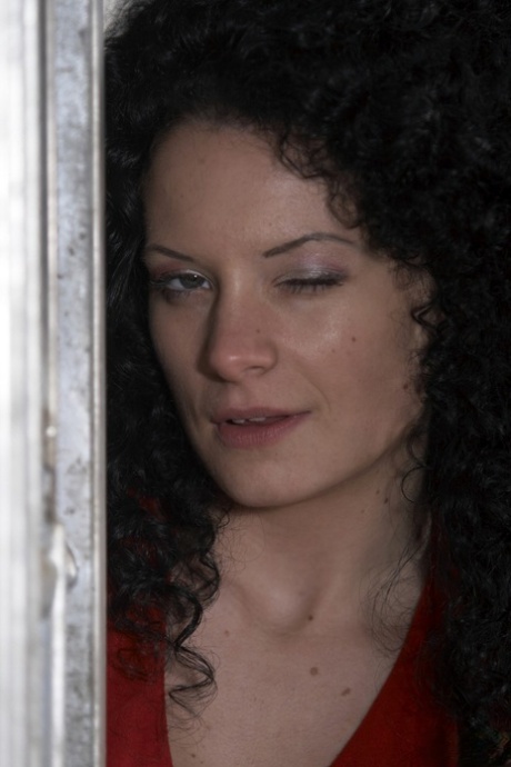 Sexy babe with black curly hair Sybelle Watson takes a chubby man's cock
