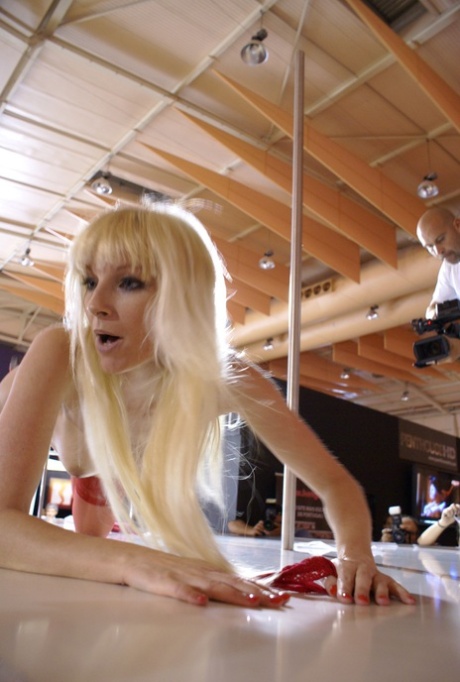 Blonde amateur dancer Lena Cova displays her stripping skills in stockings