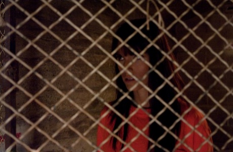 Slutty inmates show their tits while changing into their prison uniforms