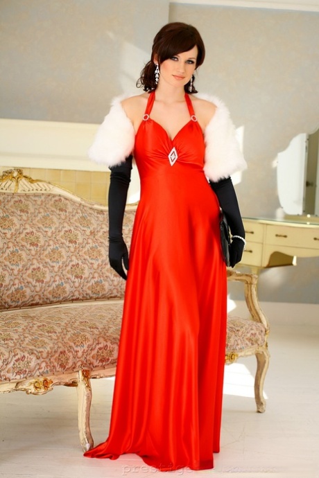Classy MILF Kitty Lea peels off elegant dress and poses in sexy lingerie