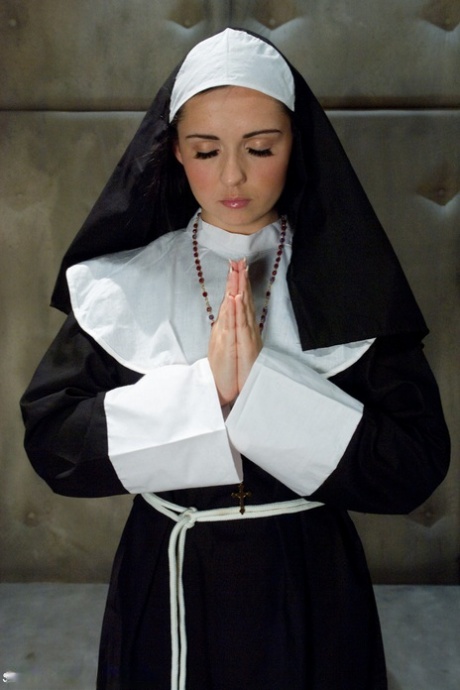 Kinky nun with a divine butt Angell Summers strips and poses nude