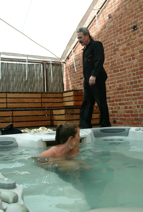 MILF with big tits Christina Carter gets bound & toyed in the jacuzzi