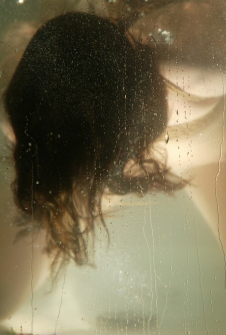 Sexy girl Sasha Sparks gets her twat toyed under water by a domme