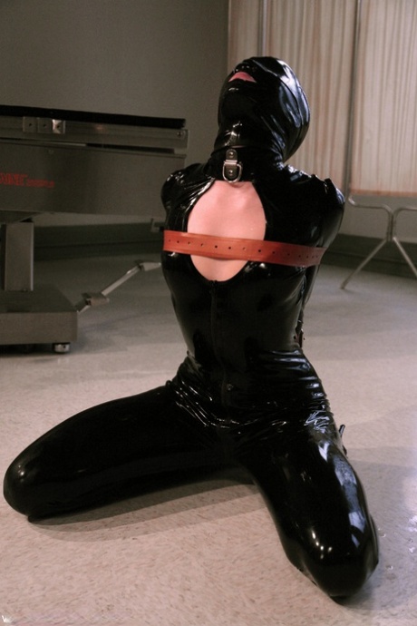 Bound latex-clad female slave Sarah Jane Ceylon gets her pussy & mouth dicked