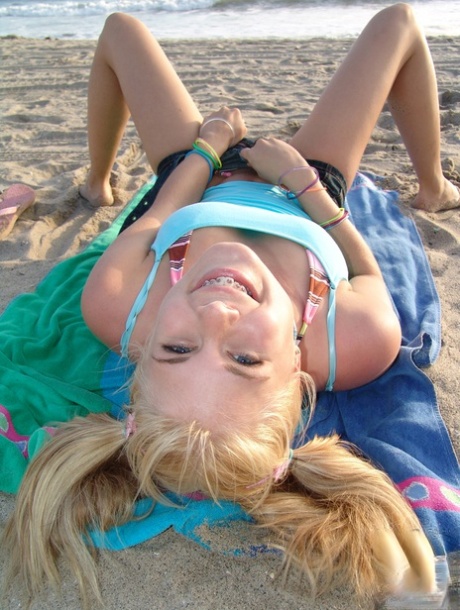 Petite teen with pigtails Summer shows off her tiny tits & her big ass