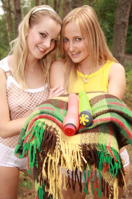 Petite amateur lesbians Paris and Rose undress and fuck in the woods