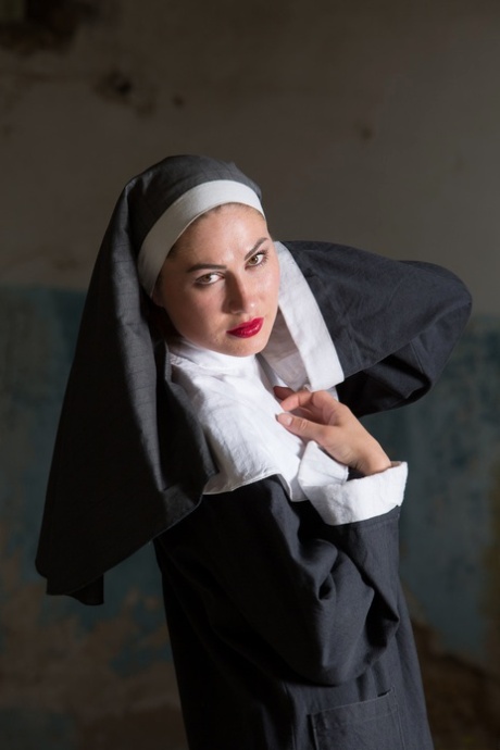 Ukrainian nun Judith Able undresses and touches her juicy tits & pussy