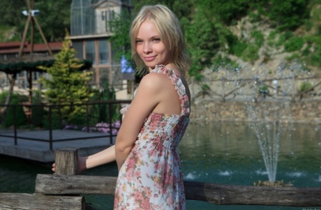 Blonde Feeona flashes her pussy in public while posing pantyless