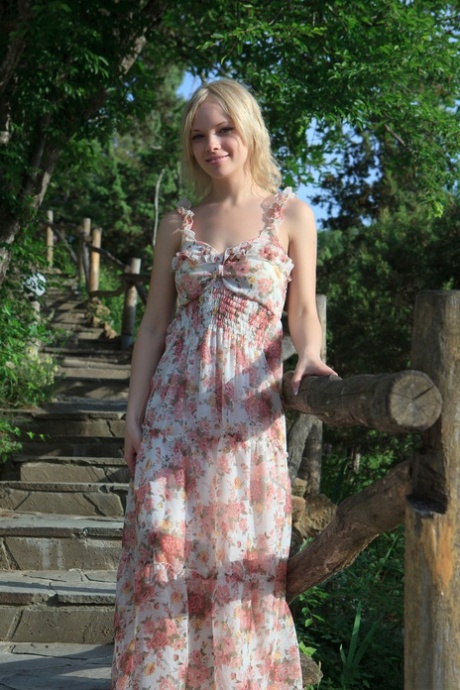 Blonde Feeona flashes her pussy in public while posing pantyless