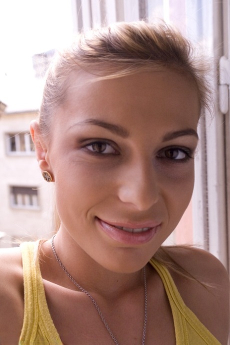Romanian beauty Jennifer Love crawling on the street ball-gagged and shackled