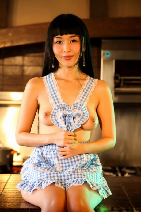 Asian housewife Marica Hase spreads her trimmed pussy on the kitchen counter