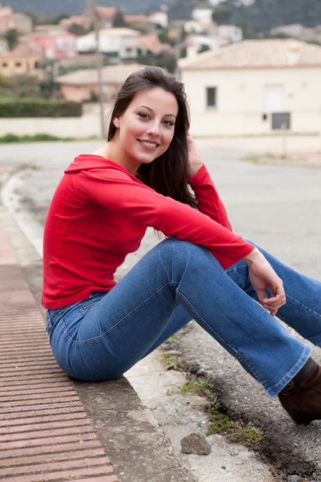 Gorgeous teen Lorena B doffs her shirt and jeans and poses naked in a solo