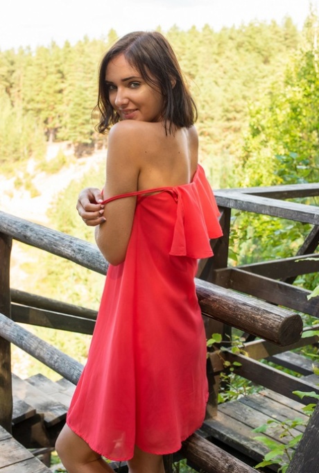 Gorgeous amateur babe Oxana Chic unveils her big ass & tits with tan lines