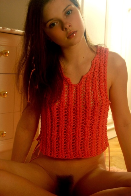 Delightful brunette teen Anna S teases with her hairy pussy and small tits