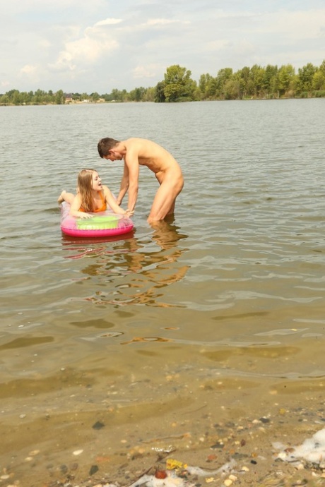 Amateur teen Alessandra strips and humps a stranger's dick by the river