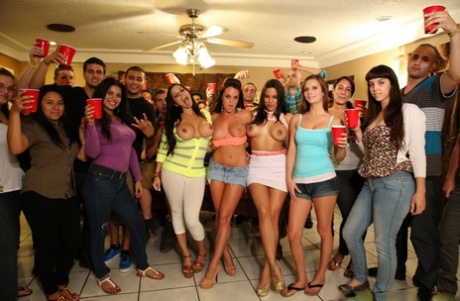 Horny pornstars with fake tits toy each other at a house sex party