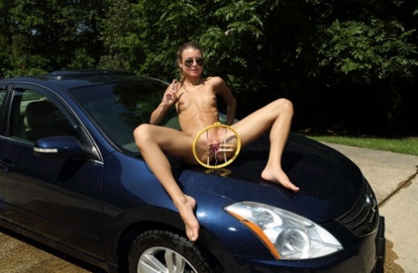 Amateur teen Asuna strips while washing a car & toys her tight pussy