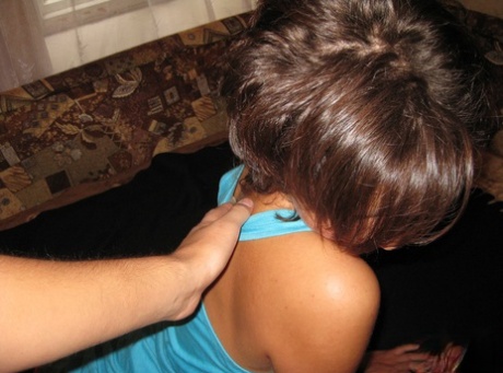 Short-haired amateur teen Jenny massages and humps her boyfriend's dick
