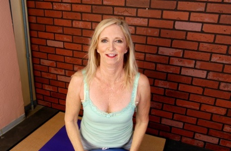 Naughty MILF Annabelle strips & spreads her shaved pussy during a workout