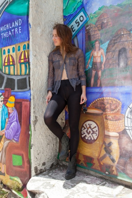Leggy teen Koya Ward flaunts hot ass while stretching outdoor in shiny tights